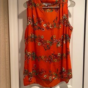 Orange floral sleeveless blouse